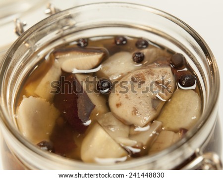 Marinated mixed fruits, vegetables and mushrooms of home canning