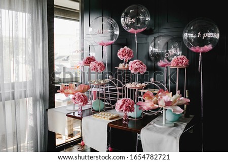 Similar – Image, Stock Photo Candy bar on wedding ceremony with a lot of different cupcakes, modern desserts, mousses and jellies. selective focus