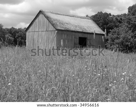Pioneer Barn in a Field