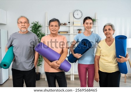 Similar – Image, Stock Photo Attractive sportswoman standing and listening music on the street