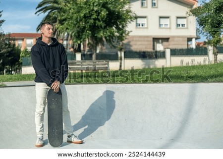 Similar – Image, Stock Photo Skateboarder resting on the ramp