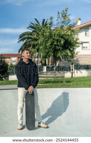 Similar – Image, Stock Photo Skateboarder resting on the ramp