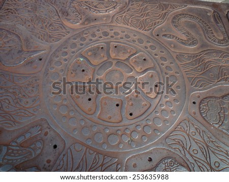 Closeup of metal deck with aboriginal art