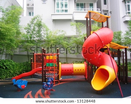 A picture of a playground with playground equipment