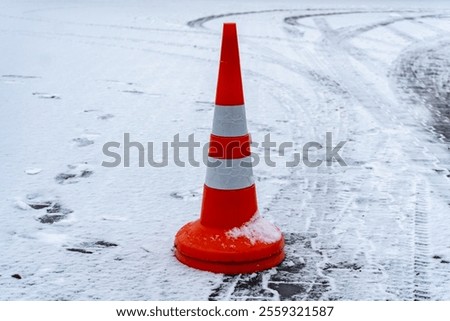 Similar – Image, Stock Photo A barrier and footprints in the slush