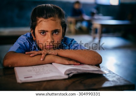 JAIPUR-MARCH 04 :child posing in the classroom  on March 04, 2014 in Jaipur,india