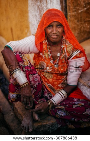 JAISALMER, INDIA - MARCH 22 : Indian woman posing in the street on March 22, 2014 in Jaisalmer, India