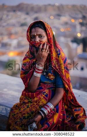JAISALMER, INDIA - MARCH 22 : Indian woman poses in the street on March 22 , 2014 in Jaisalmer, India