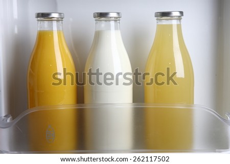 Juice bottles in the fridge