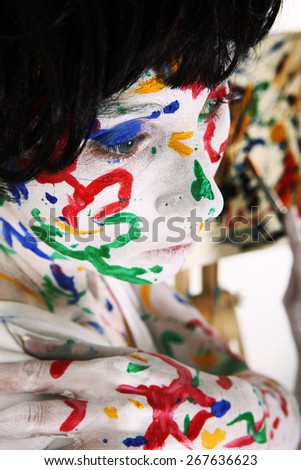 Body painted woman painting