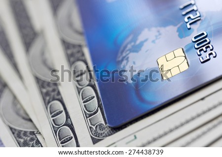 Credit card and banknotes. Shallow depth of field.