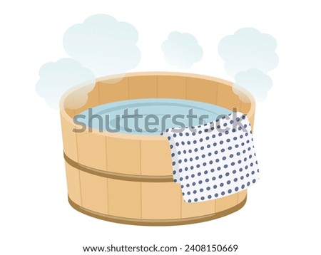 Bathtub with hot water and towel