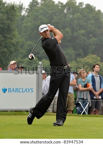 EDISON, NJ-AUGUST 27: Golfer Dustin Johnson tees off at the 2nd tee during the final round of the Barclays tournament  at the Plainfield Country Club on August 27, 2011 in Edison, NJ.