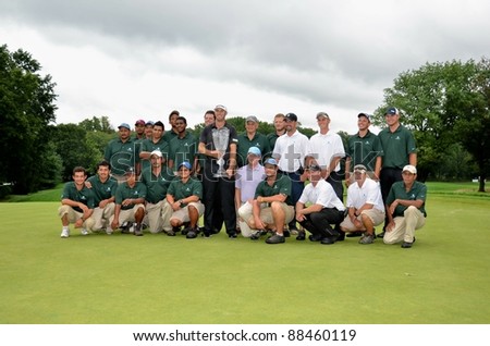 EDISON,NJ-AUGUST 27: Golfer Dustin Johnson (center) with the Plainfield Country Club Grounds Crew after winning the Barclays held at the Plainfield Country Club on August 27,2011 in Edison,N.J.