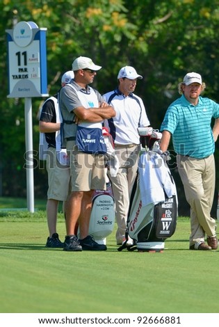 EDISON,NJ-AUGUST 26: Golfers Padraig Harrington (C) and William McGirt (R) during the second round of the Barclays Tournament held at the Plainfield Country Club on August 26, 2011 in Edison, N.J.