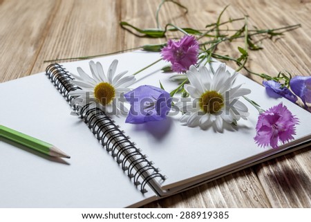 wildflowers end notebook on woodwen table