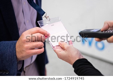 Scanning visitor pass to enter an event or conference Foto stock © 