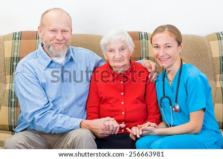Elderly woman and her son at the doctor