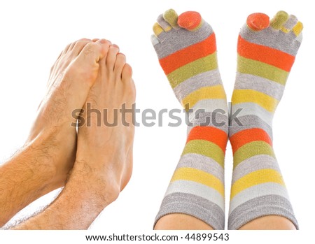 The girl in a colorful sock and the man freezing near she
