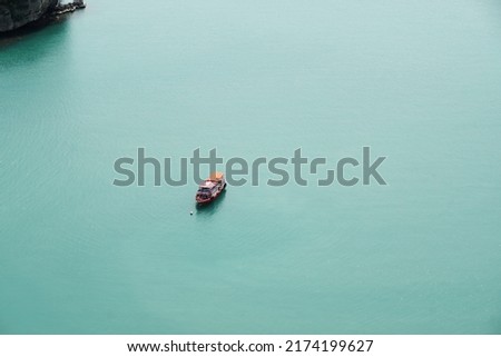 Traditional Thailand boat floating on the sea - minimal landscape nature - seen from view point of Angthong Islands National Marine Park from Pha jun jaras nature trail Koh Was Ta Lup Island Zdjęcia stock © 
