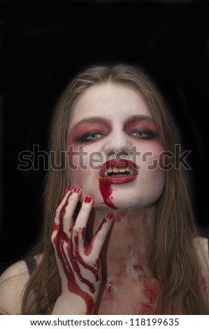 Vampire with blood in the mouth