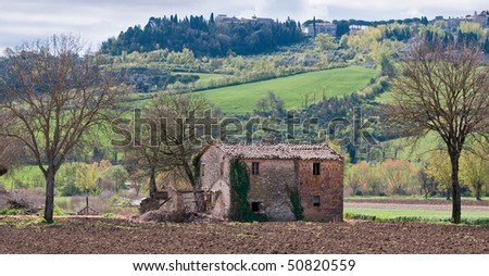 Abandoned farmhouse in Italian landscape