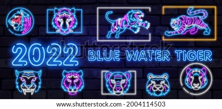 Neon Chinese new year 2022 year of the tiger, line art character, neon style on black background. Happy chinese new year 2022, year of tiger