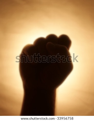 Back-lit hand signaling \'freedom\'