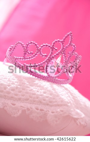 Pink crown lying on the pillow