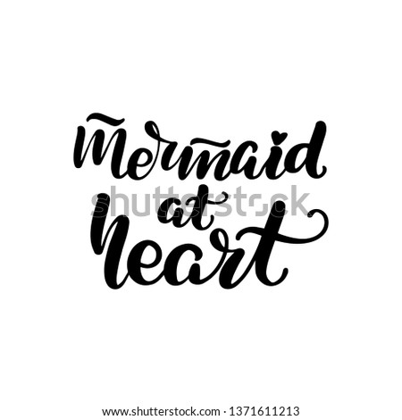 Inspirational handwritten brush lettering mermaid at heart. Vector illustration isolated on white background.