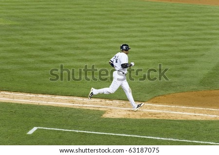 NEW YORK CITY - AUGUST 2: Robinson Cano is running bases on August 2, 2010 in Yankee Stadium, New York City. Cano is in contention for the MVP this year