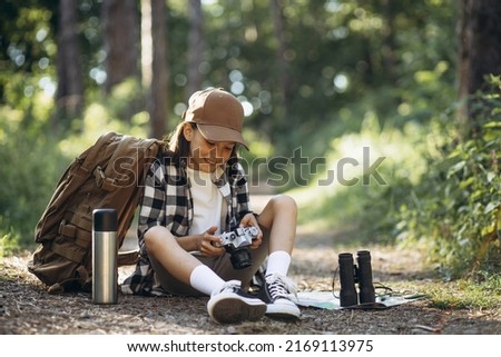 Similar – Image, Stock Photo Casual tourist making photo on smartphone of nature