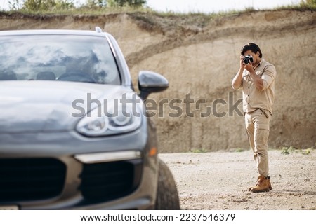 Similar – Image, Stock Photo Casual tourist making photo on smartphone of nature