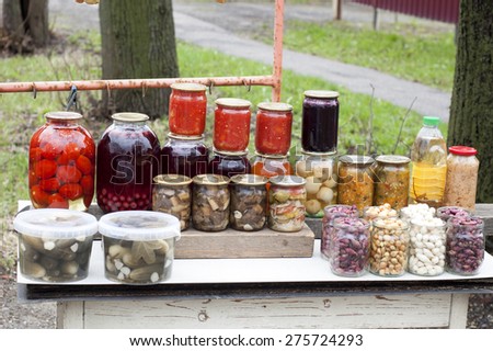 Home canning of fruits and vegetables. For sale at the village market, canning fruits and vegetables.