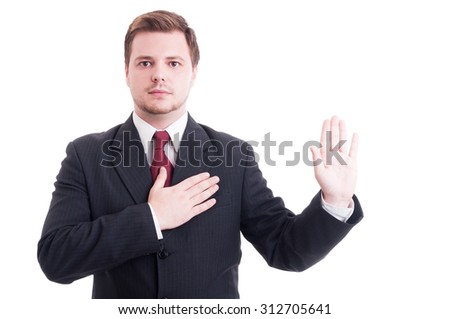 Young Lawyer Making Oath Or Swearing Gesture With One Hand On The Heart ...