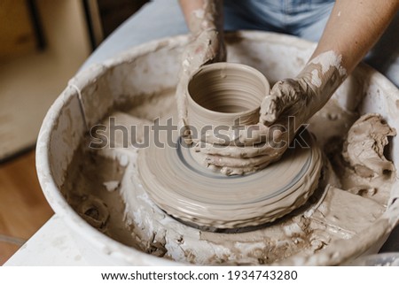 Female hands make dishes from clay Stockfoto © 