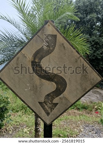 Image, Stock Photo Careful, sharp bend!