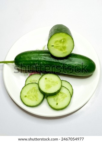 Similar – Image, Stock Photo Plate with a cucumber skewer on a white background