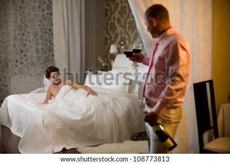 newly married couple  in hotel room,  romance wedding night