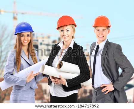 Group of builders workers. Construction industry background.