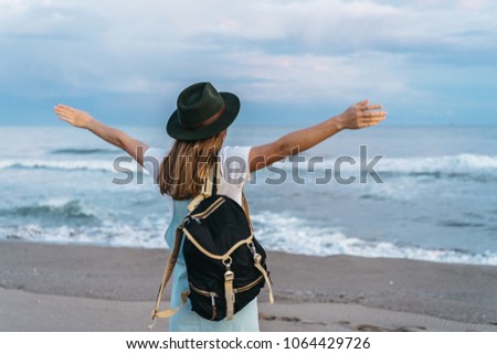 Image, Stock Photo Traveler enjoying freedom while standing on hilltop and observing wide highland