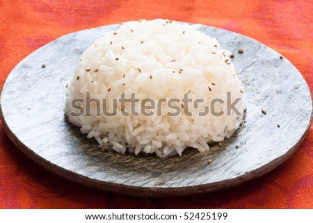 Single serving of steamed rice topped with cumin. A very popular side dish with Indian food.