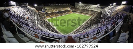 VALENCIA - JANUARY 25: Crowd of people in Mestalla stadium during Spanish League match, on January 25, 2014, in Valencia, Spain.