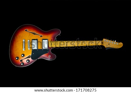 ZAGREB , CROATIA - JANUARY 14 ,2014 : fender starcaster red electric guitar on black background , product shot