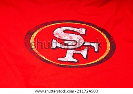 ZAGREB , CROATIA - AUGUST 19 , 2014 :  NFL San Francisco 49ers club logo printed on textile equipment ,product shot