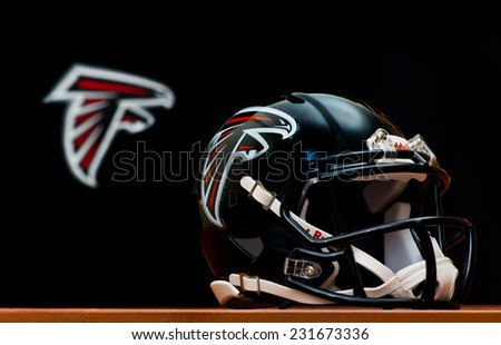 ZAGREB , CROATIA - NOVEMBER 19 , 2014 :  NFL Atlanta Falcons equipment , helmet and flag   ,product shot