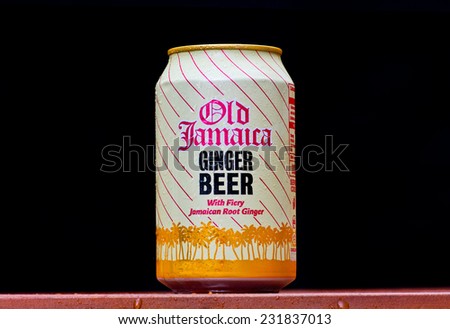 ZAGREB , CROATIA - NOVEMBER 19 ,2014 :   Old Jamaica ginger beer can splashed with water on black background, product shot