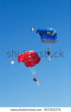 Zadar ,Croatia- March 22 , 2014 : two colorful parachute landing at the aero meeting