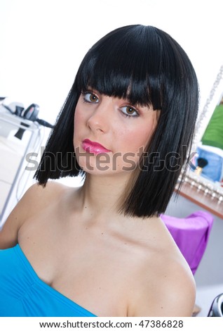 woman wearing black wig in hair salon