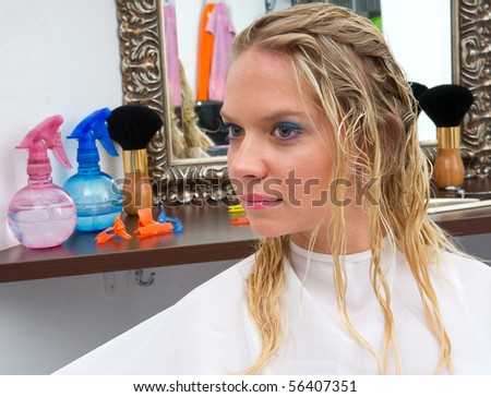 woman with wet hair in salon